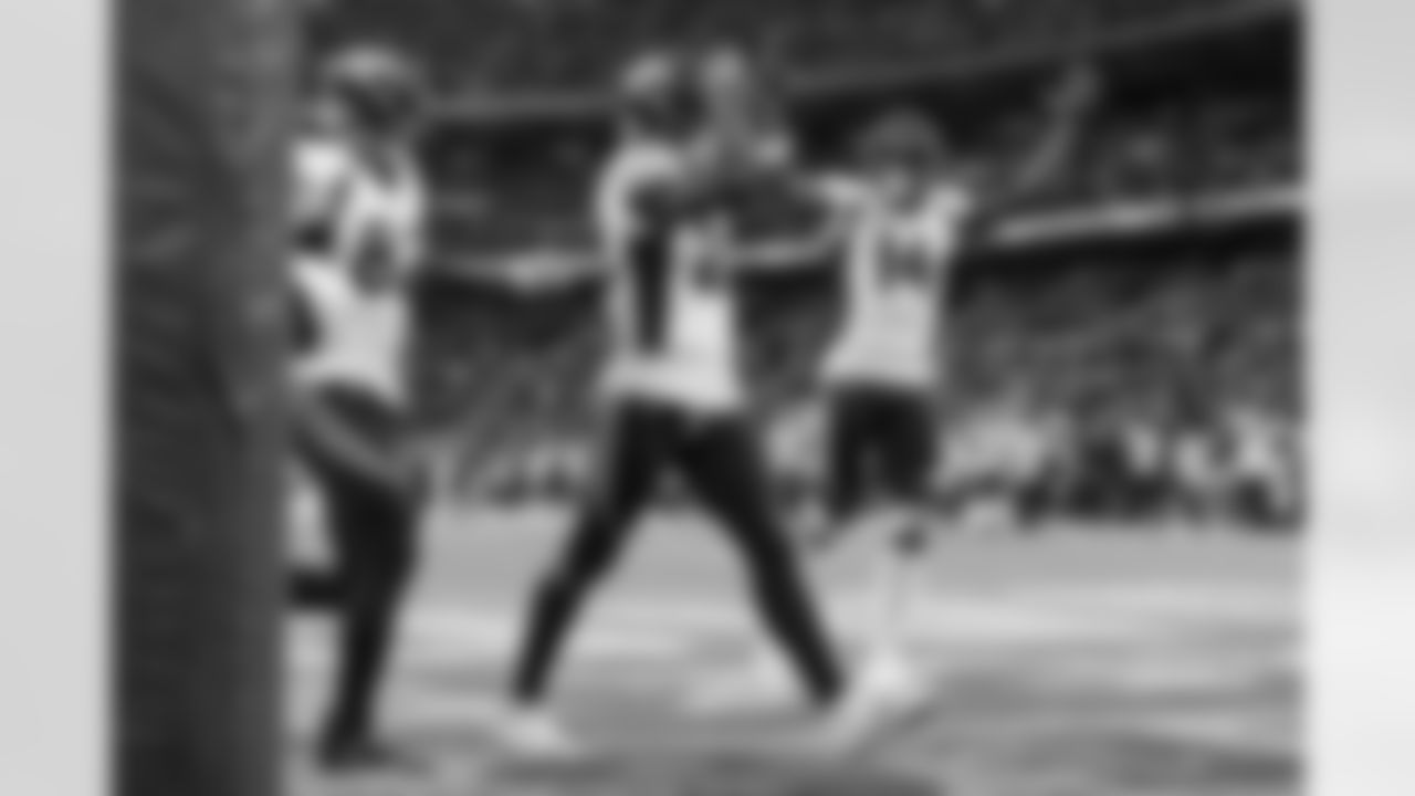 Eric Saubert and Courtland Sutton run over to celebrate with Latavius Murray after Murray scored the go-ahead touchdown in the fourth quarter during the Broncos' Week 8 game against the Jacksonville Jaguars at Wembley Stadium in London, England in the United Kingdom on October 30, 2022. (Photo by Ben Swanson)