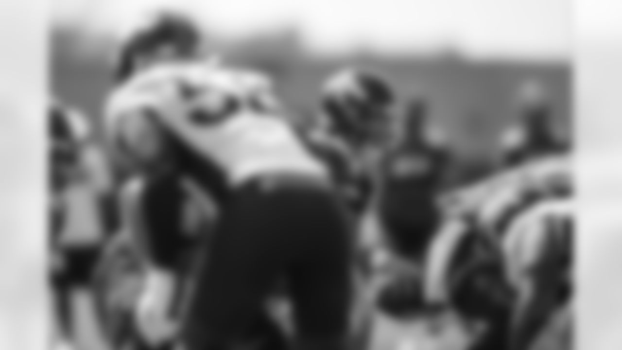 Drew Lock takes a snap from under center during the fifth training camp practice at UCHealth Training Center on August 19, 2020. (Photo by Ben Swanson)