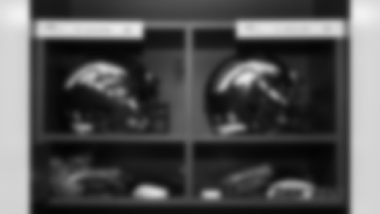 Helmets for Matt LaCosse and Austin Traylor in the locker room pregame before the Broncos' preseason game against the Washington Redskins at FedExField on August 24, 2018.