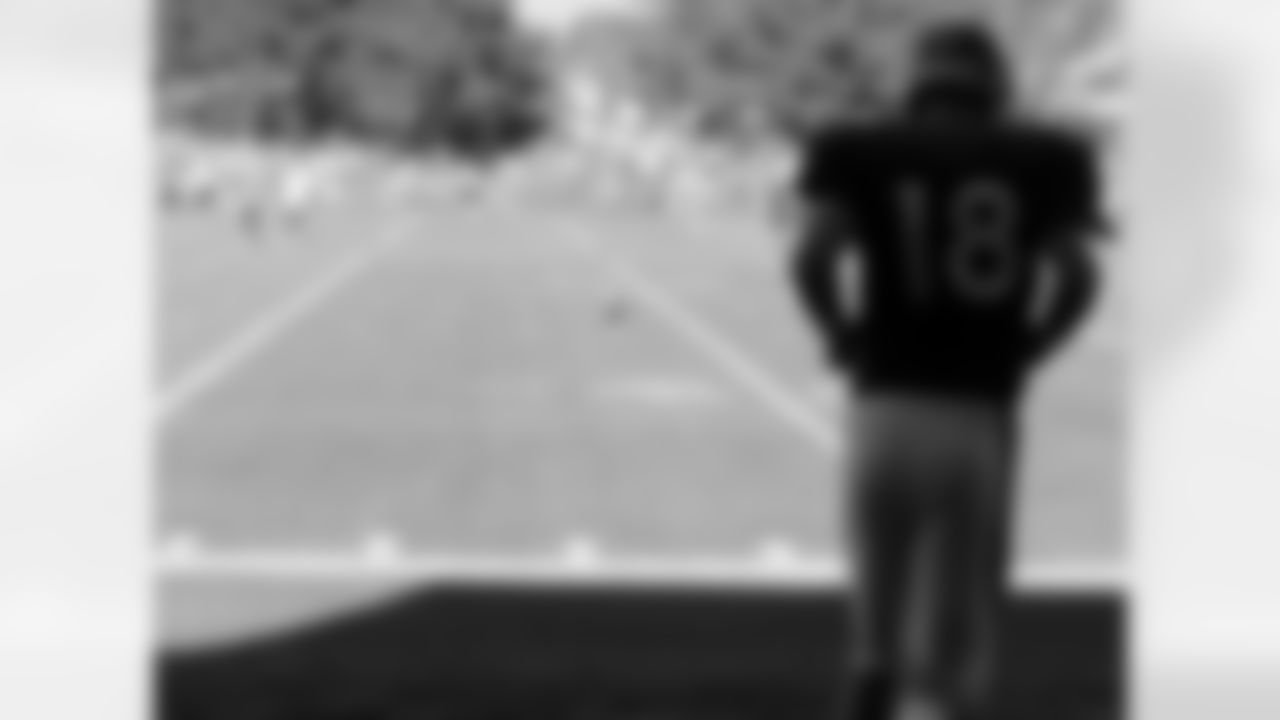 Manning takes the field.