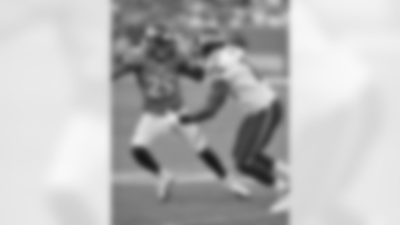 Cornerback Drayton Florence locks up wide receiver Terrell Owens in coverage.
