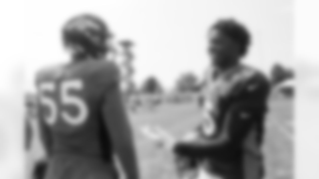 Bradley Chubb and Teddy Bridgewater during practice on the sixth day of training camp at UCHealth Training Center on August 3, 2021. (Photo by Ben Swanson)