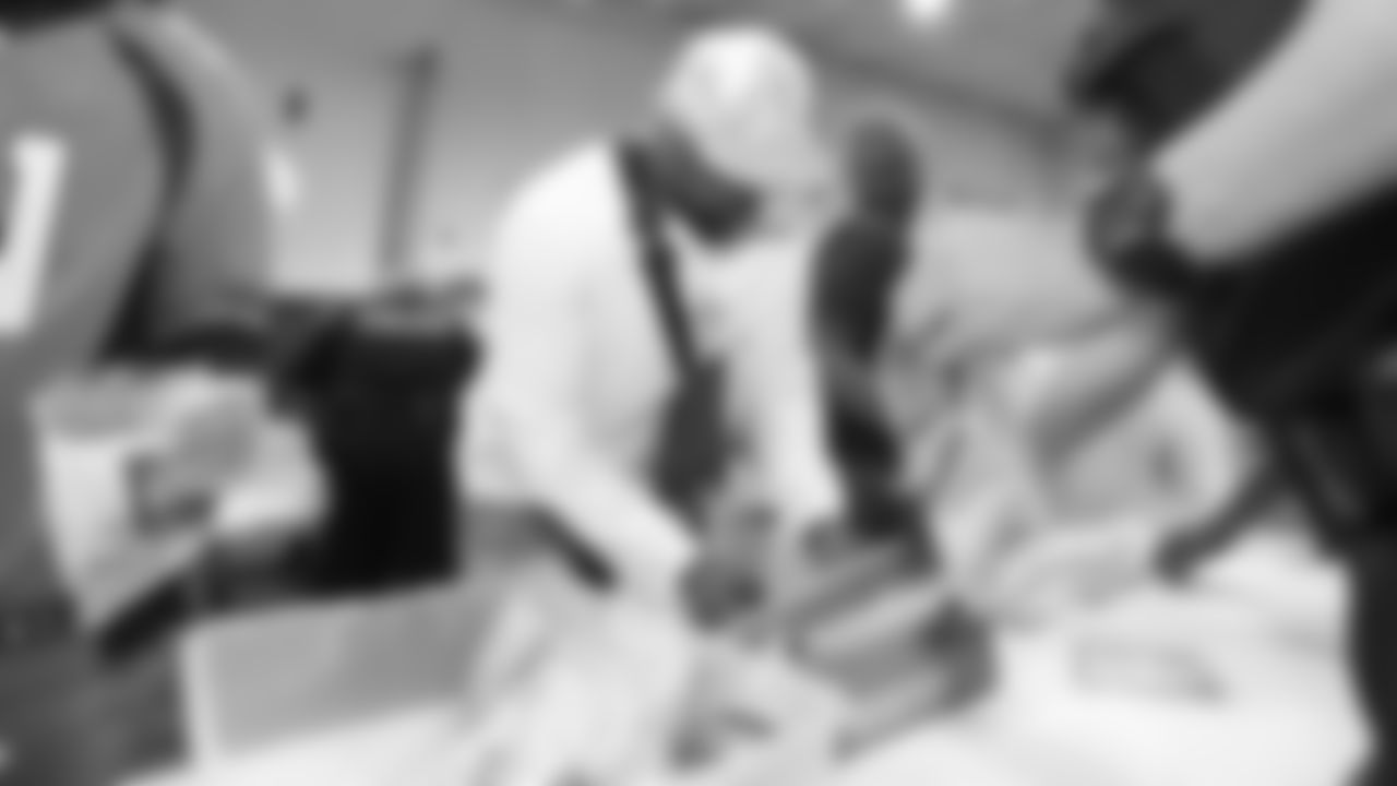 Von Miller during a meal-packaging event with Feeding Children Everywhere at the Denver Broncos Boys & Girls Club on May 14, 2019, with volunteers from the Broncos, the Denver Police Department and the club.
