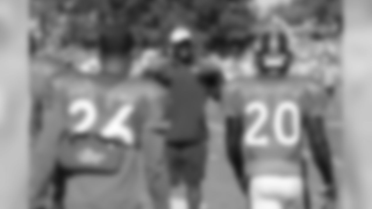 Assistant Secondary Coach Sam Garnes leads the safeties to their next drill.