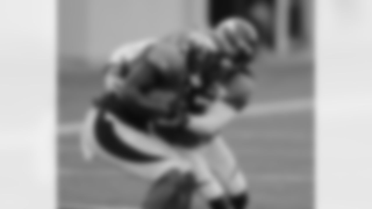 CB Omar Bolden wraps up S Duke Ihenacho.