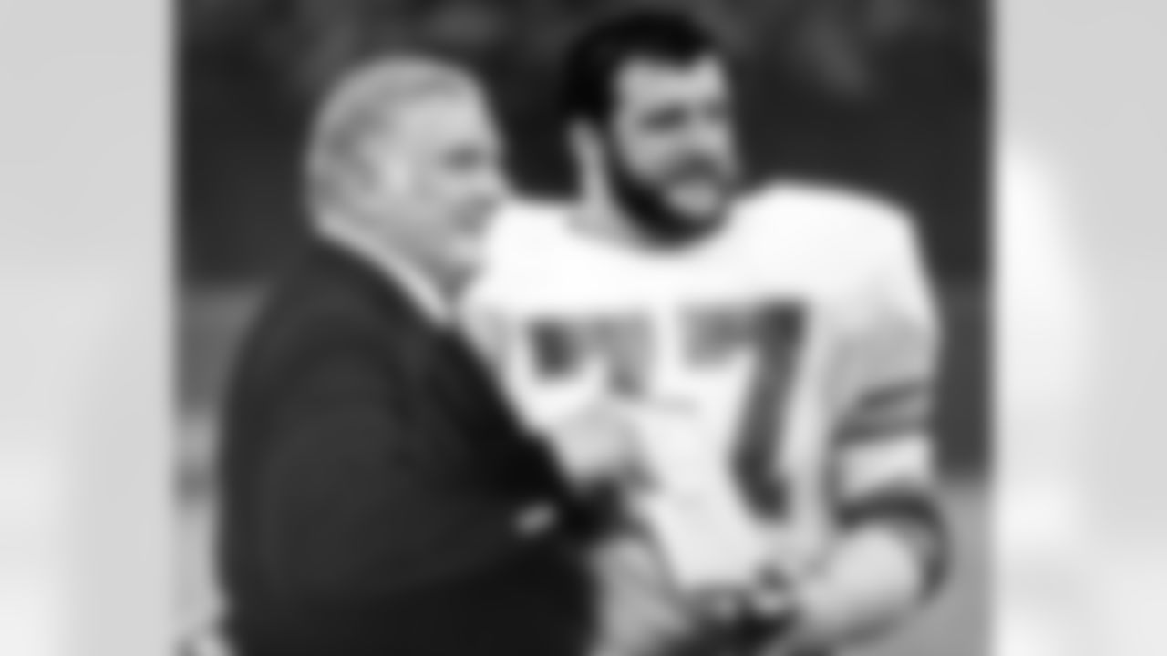 Defensive tackle Lyle Alzado is presented with the Gordon's Gin Good Guy Award before an August 28, 1977 loss (24-28) to the Eagles in Philadelphia.