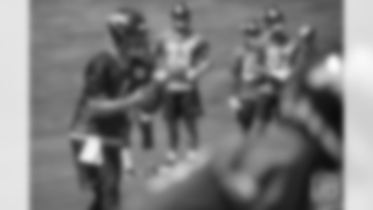 quarterback Case Keenum (4) glances at a receiver after the snap during the 10th and final day of OTAs on June 7, 2018 at UCHealth Training Center.
