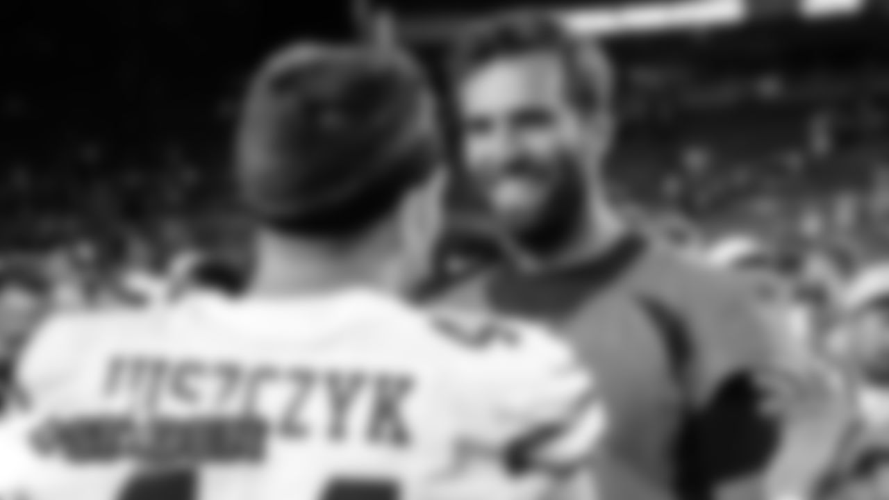 Joe Flacco talks with Kyle Juszczyk after the preseason game against the San Francisco 49ers at Broncos Stadium at Mile High in Denver, Colorado, August 19, 2019. The 49ers won the game 24-15.
Photo by Marc Piscotty