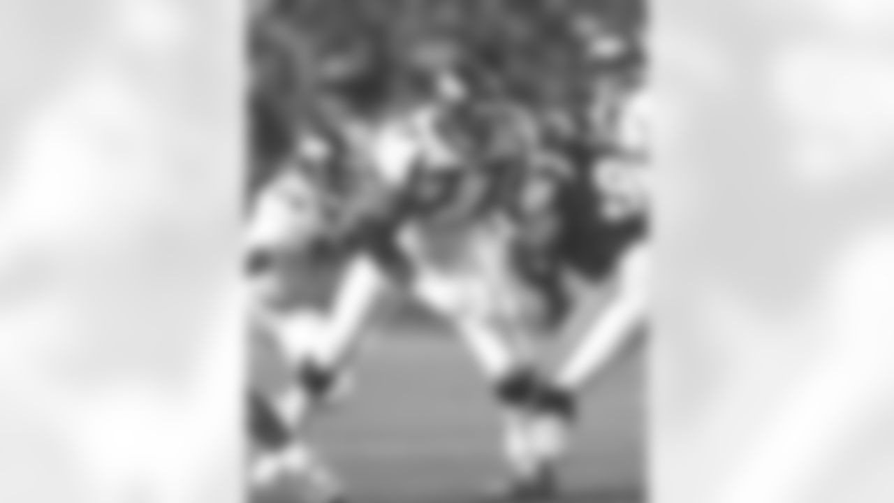 San Diego: Tony Jones pass blocks for the quarterback against the San Diego Chargers at Jack Murphy Stadium in San Diego, CA on November 30, 1997.