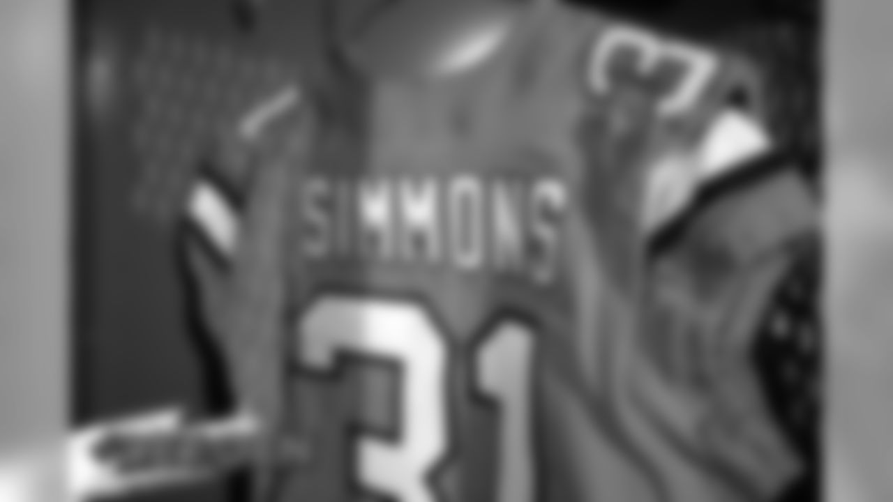A preview of Justin Simmons' Color Rush jersey during a photoshoot ahead of the team's Week 16 game against the Lions on December 18, 2019 at UCHealth Training Center. (Photo by Ben Swanson)