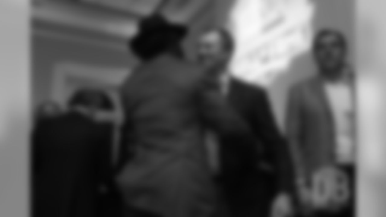 John Lynch greets Ed Reed during a presentation of the Hall of Fame finalists at the Pro Football Hall of Fame's Celebration of Excellence Reception in Atlanta on January 31, 2019.