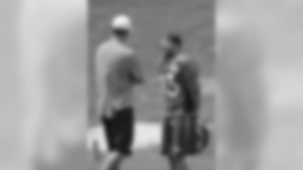 OC Adam Gase and WR Wes Welker