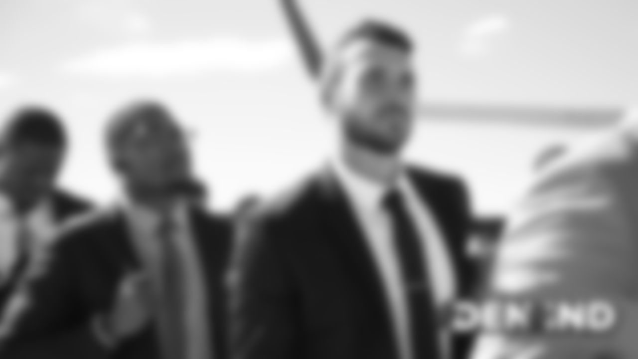 Brandon Allen on the tarmac at Denver International Airport during the team's travel to Indiana on October 26, 2019 ahead of their Week 8 game against the Indianapolis Colts. (Photo by Ben Swanson)
