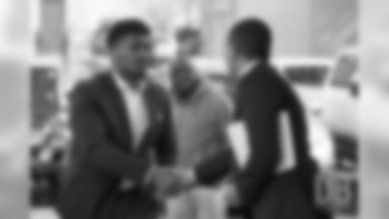 Dre'Mont Jones greets Executive Vice President of Public and Community Relations Patrick Smyth during the arrival tour for Day 2 picks at UCHealth Training Center on April 27, 2019 after the Broncos drafted them in the 2019 NFL Draft.