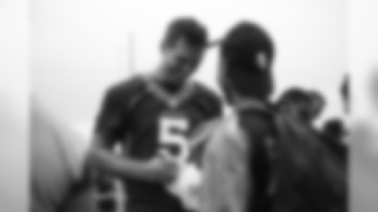 Joe Flacco signs autographs for military members from the USAA Salute to Service NFL Boot Camp after practice on August 21, 2019 at UCHealth Training Center.
