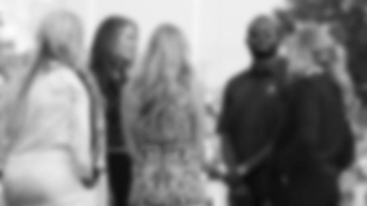 Champ Bailey talks with Amie Klemmer, Beth Bowlen Wallace, Annabel Bowlen and Brittany Bowlen before the Broncos' preseason matchup with the Falcons in the Pro Football Hall of Fame Game on August 1, 2019 at Tom Benson Hall of Fame Stadium.