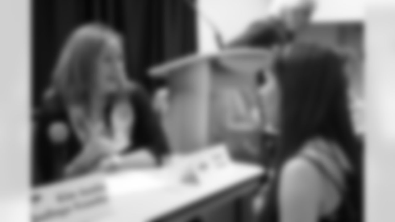 Senior Director of Partnership Marketing Sandy Young speaks to a student at the Women in Sports Symposium on March 27, 2017 at Colorado State University in partnership with Denver Broncos Sports Management Institute.
