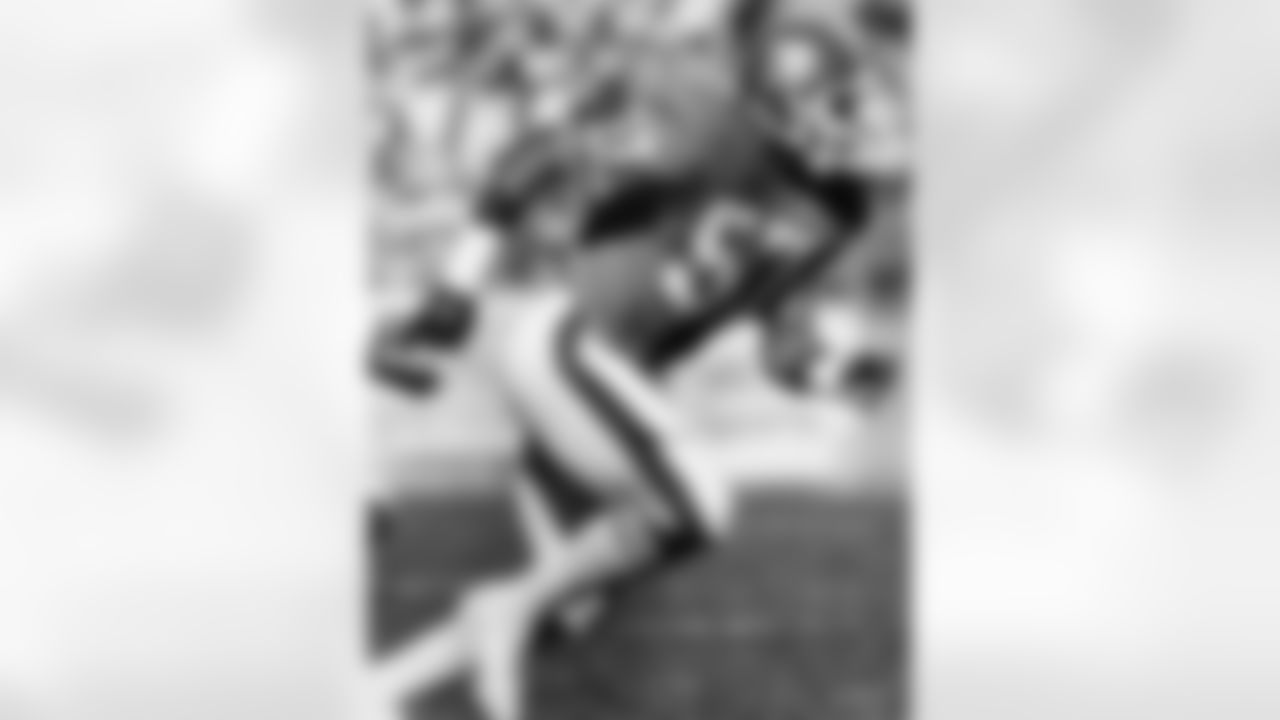 Linebacker Tom Jackson plays defense during a game at Mile High Stadium.