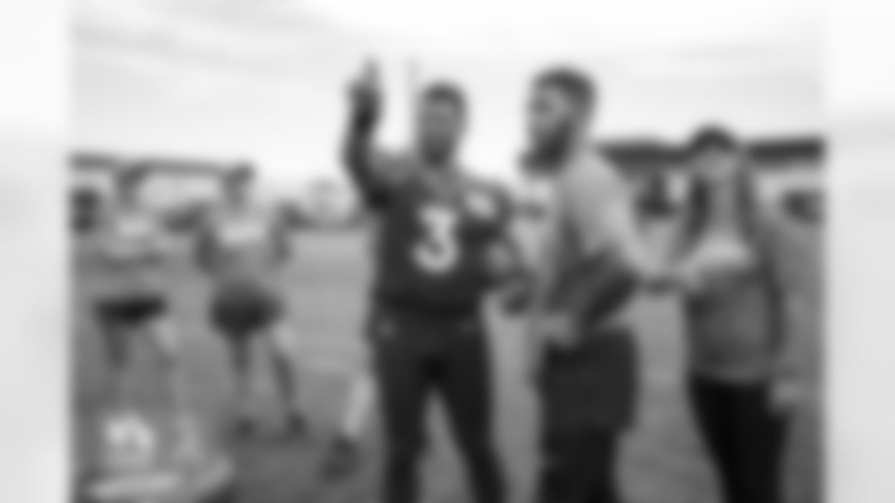 Russell Wilson conducts a competition with military members trying to hit the crossbar with a football during a USAA Salute to Service meet-and-greet session after practice at UCHealth Training Center in Englewood, Colorado on August 25, 2022. (Photo by Ben Swanson)