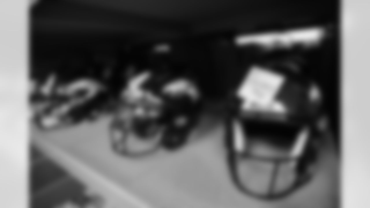 A view of helmets prepared for rookies, including Javonte Williams, at UCHealth Training Center on May 12, 2021. (Photo by Ben Swanson)