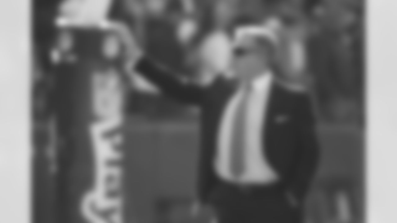 E.V.P of Football Ops. John Elway takes in the scene at Arrowhead Stadium prior to kickoff.