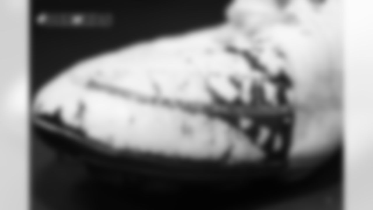 One of Brandon McManus's cleats in the locker room pregame before the Broncos' preseason game against the Washington Redskins at FedExField on August 24, 2018.