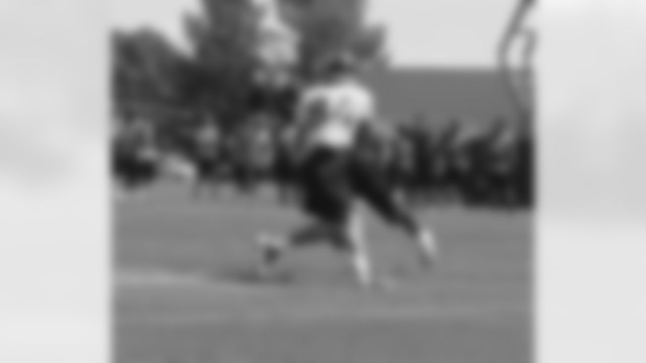 Adams dives in to break up the pass.