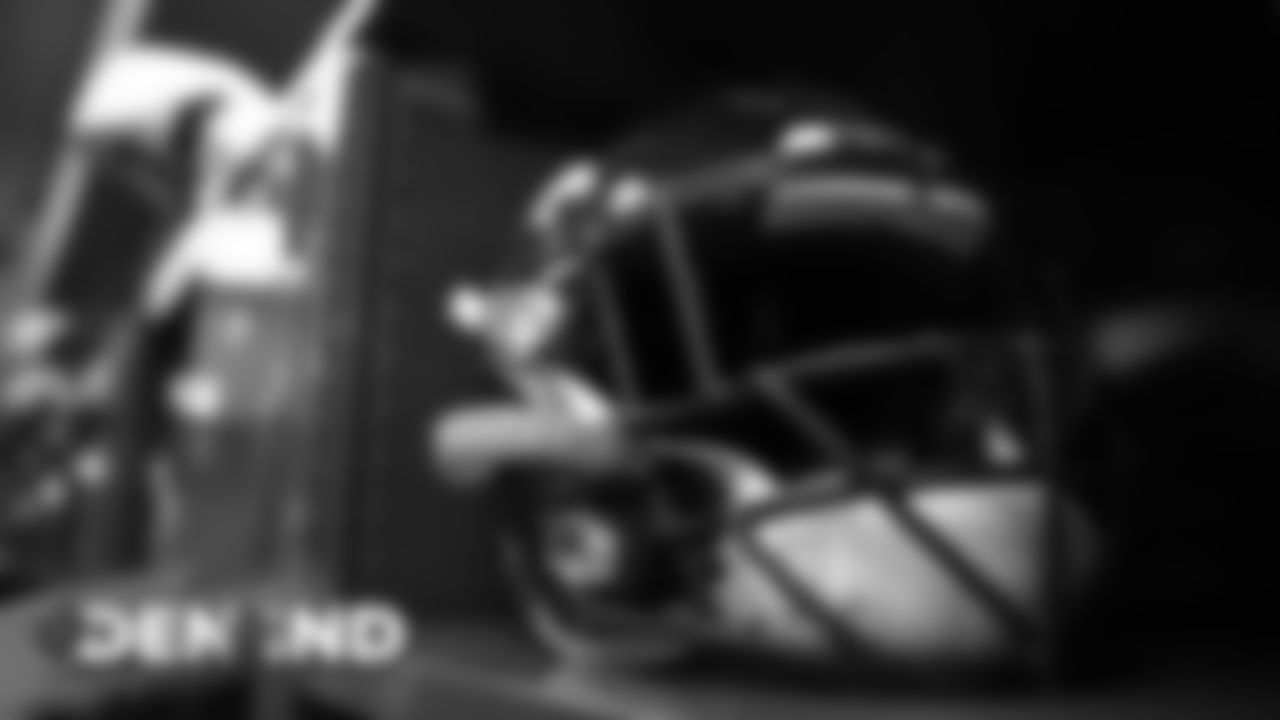 A helmet in the visiting locker room for the Broncos' game against the Indianapolis Colts at Lucas Oil Stadium on October 27, 2019. (Photo by Ben Swanson)