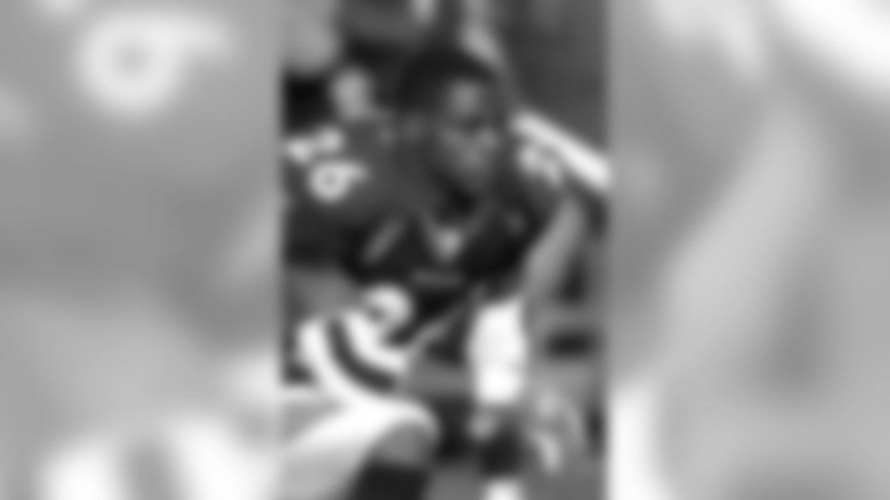 Clinton Portis gets mentally prepared for the matchup against the Chiefs against the Kansas City Chiefs at Invesco Field at Mile High in Denver, CO on December 15, 2002.