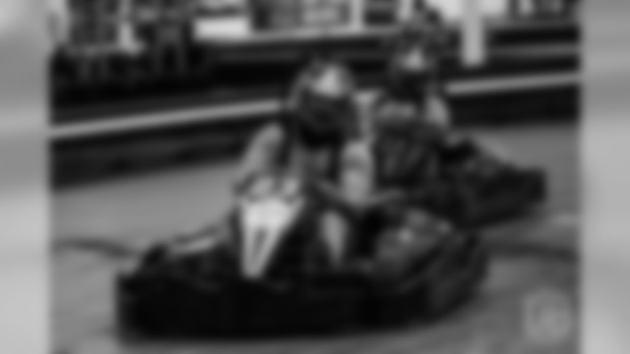 a player (maybe Marcus Rush?) at Von's Vision fourth annual Go-Kart Grand Prix to fundraise for the foundation.