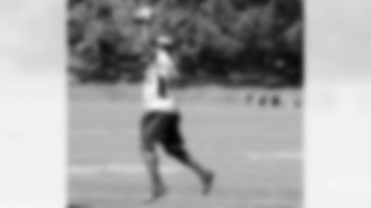 CB Cassius Vaughn comes down with an interception during position drills.