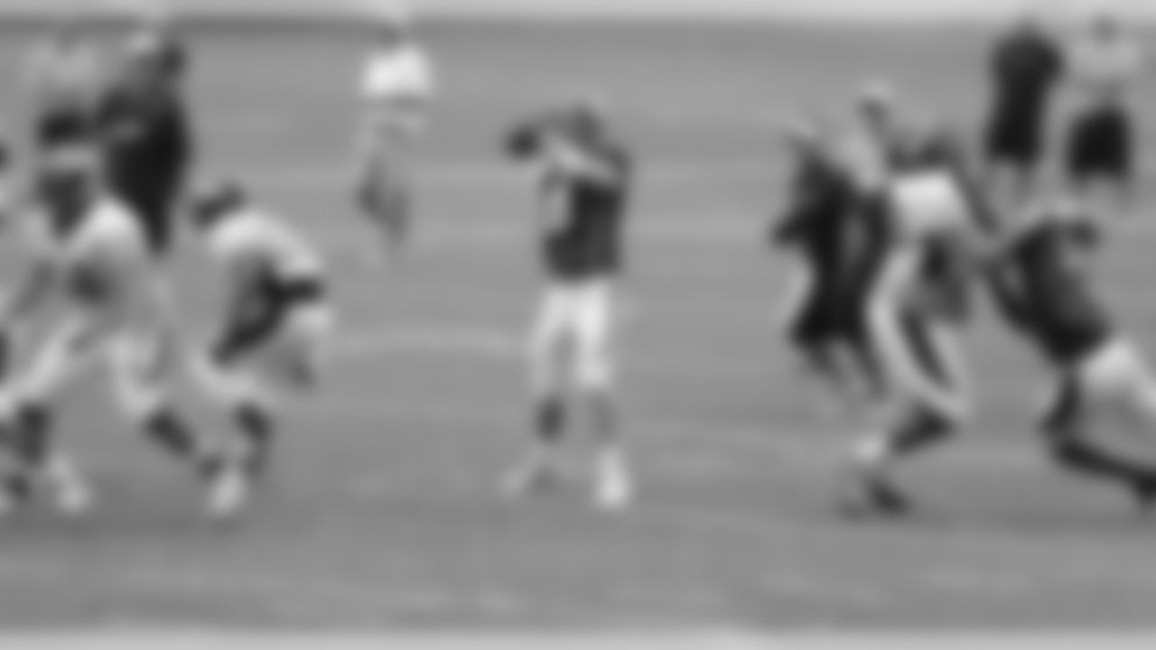 Manning fires a deep pass down the sideline.