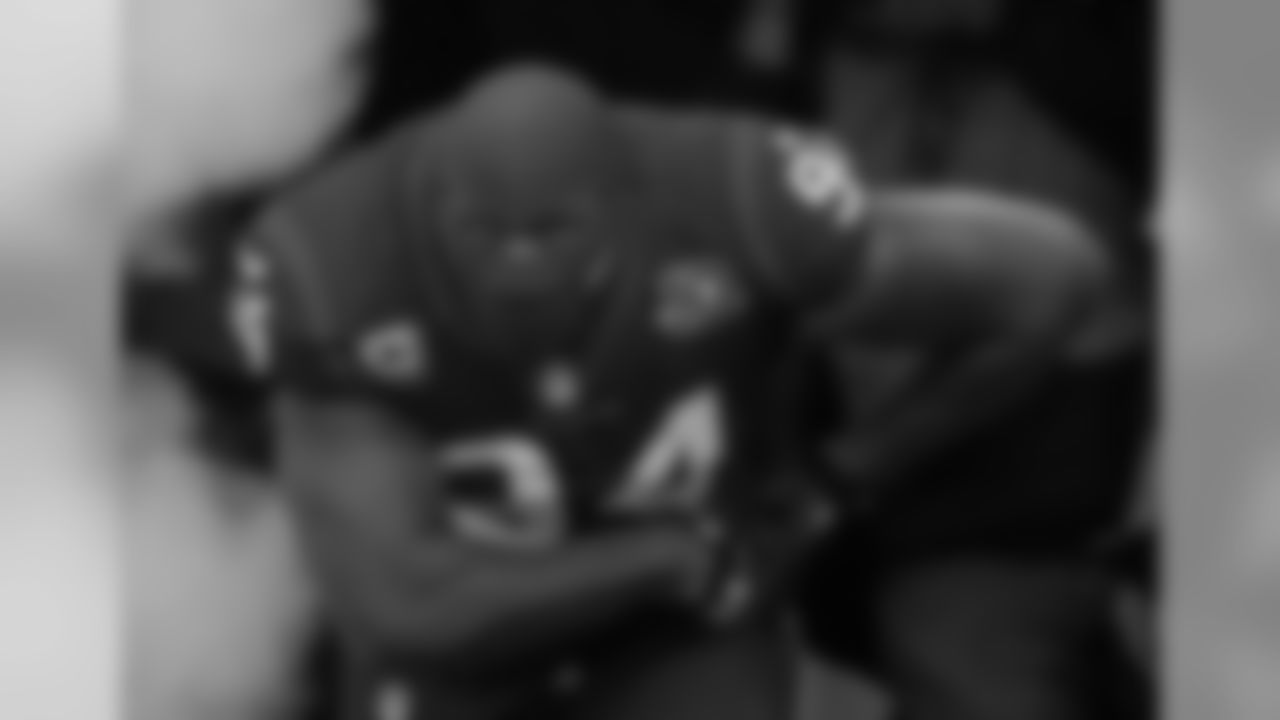 Former Texans defensive end Antonio Smith takes to the field with a ninja-esque flair in 2013.