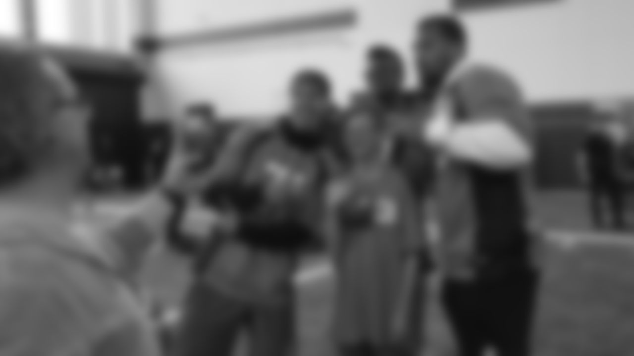 Justin Simmons, DaeSean Hamilton and Bradley Chubb pose for a photo with an athlete during a PLAY 60 All-Ability Clinic with Special Olympics Colorado for 125 athletes at UCHealth Training Center at May 7, 2019.