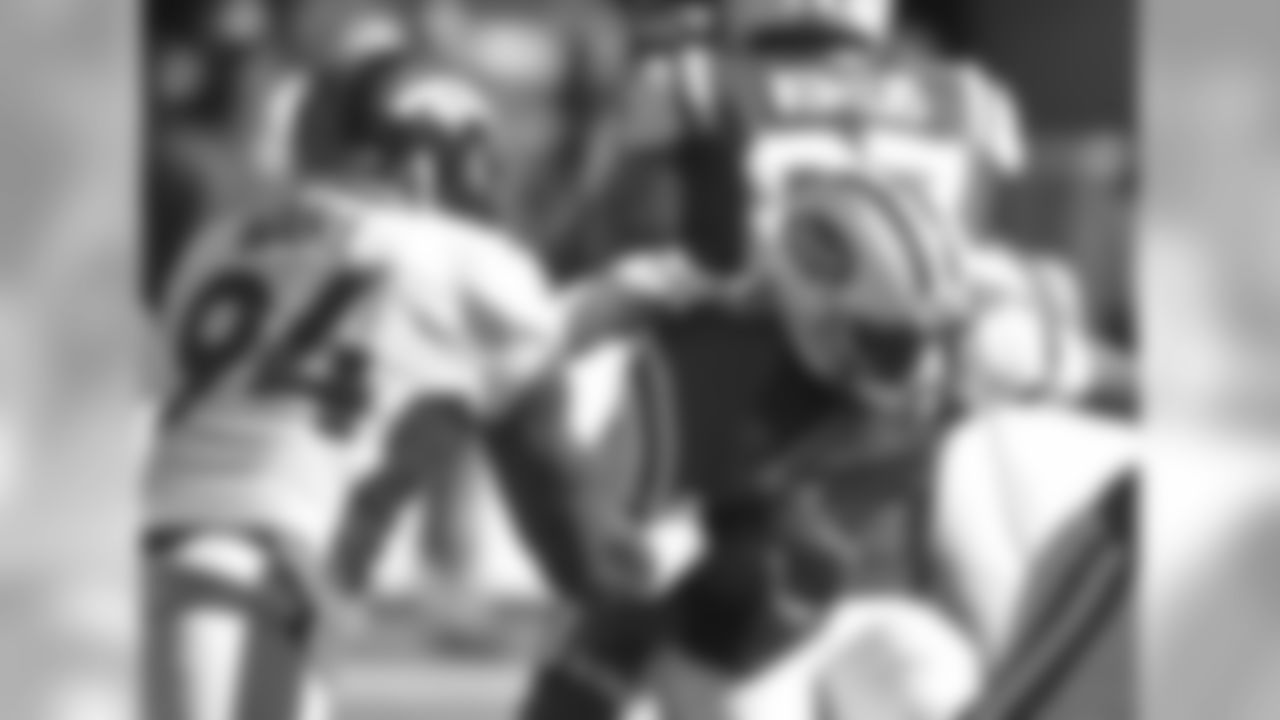 DeMarcus Ware and Geno Smith