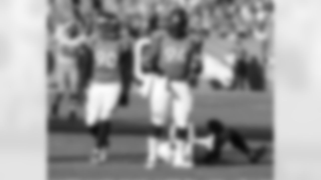 Shaun Phillips and Terrance Knighton