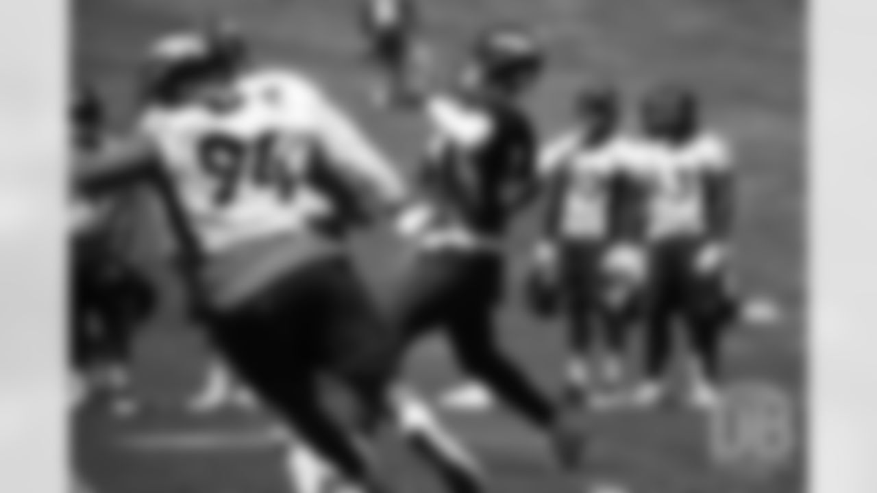 Drew Lock unleashes a pass during the Broncos' practice on the eight day of their OTAs on May 30, 2019.