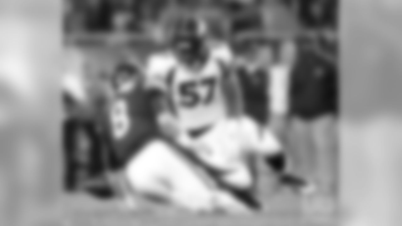 August 10
DeMarcus Walker's eyes get big as he sees a loose football on the ground after a botched snap during the Broncos' preseason opener, his first NFL game as a rookie.