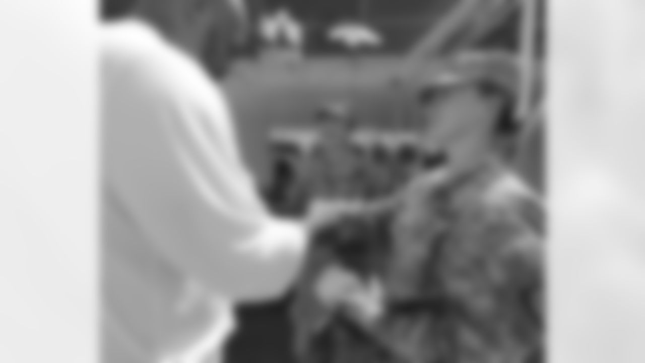 Ramirez shares a laugh with the soldiers from Fort Carson.