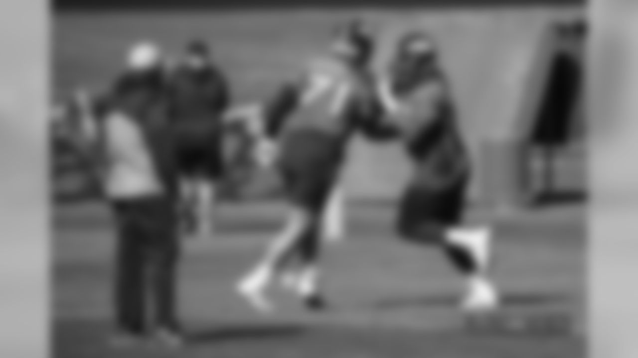 Head Coach Vance Joseph watches as Ron Leary and Austin Schlottmann take part in a drill at practice at UCHealth Training Center on October 12, 2018.