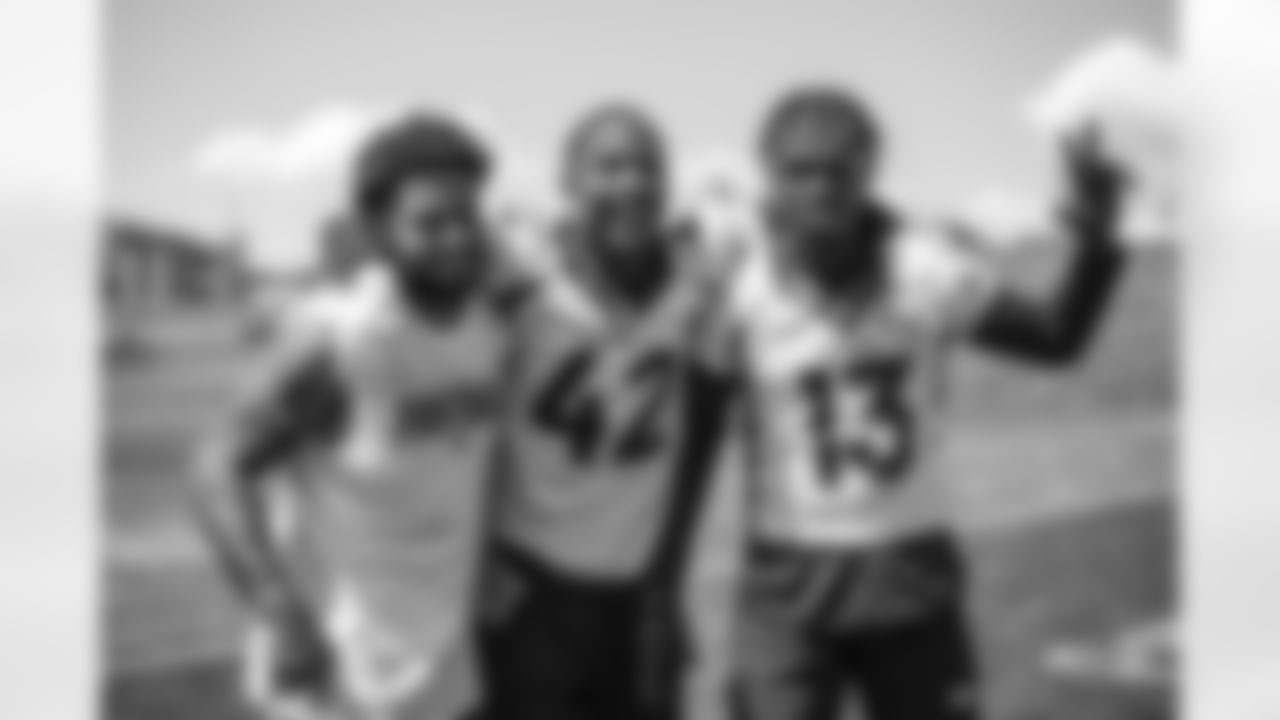 P.J. Locke, Parnell Motley and Michael Ojemudia pose for a photo after the seventh day of OTA practices at UCHealth Training Center on June 7, 2021. (Photo by Ben Swanson)