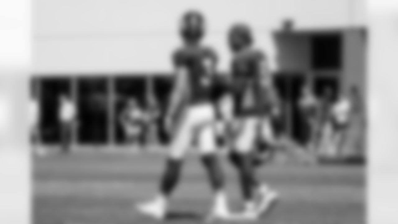 Teddy Bridgewater and Drew Lock during practice at UCHealth Training Center on August 25, 2021. (Photo by Ben Swanson)