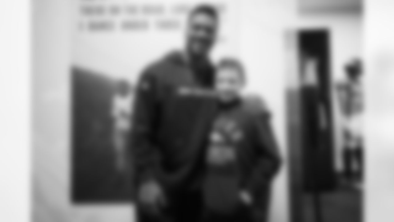 Russell Wilson during a Make-A-Wish visit from Logan at Centura Health Training Center in Englewood, Colorado on October 28, 2023. Photo by Ben Swanson / Denver Broncos