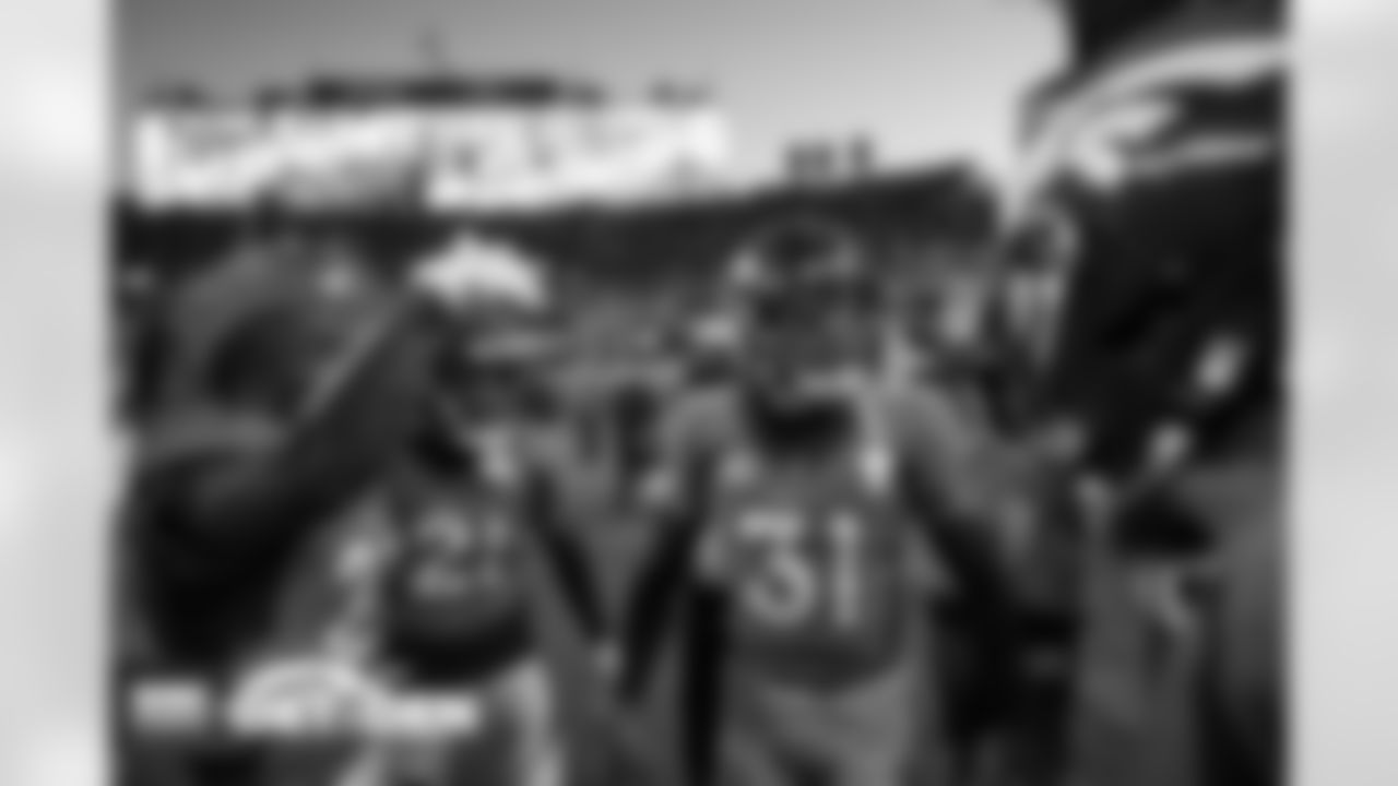 Justin Simmons, Kareem Jackson and Ronald Darby during the Broncos' Week 14 game against the Detroit Lions at Empower Field at Mile High in Denver, Colorado on December 12, 2021. (Photo by Gabriel Christus)