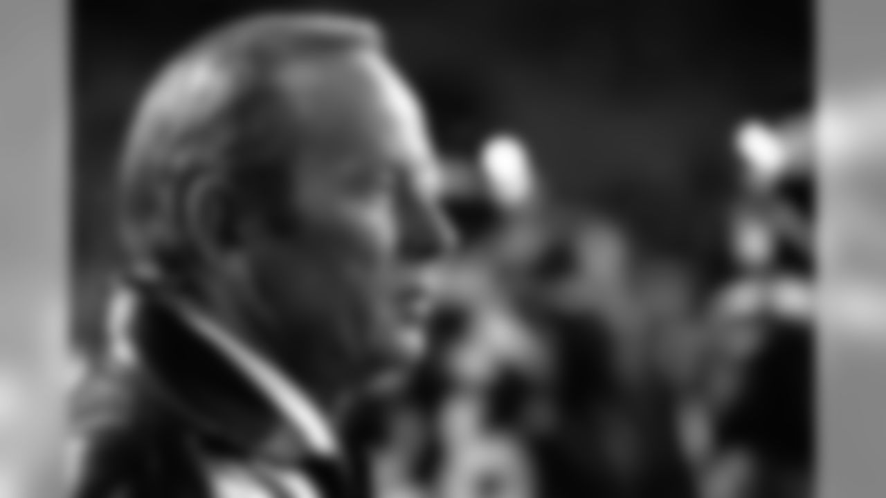 Owner Pat Bowlen watches his team during the pregame drills against the Oakland Raiders at Mile High Stadium in Denver, CO on November 13, 2000.