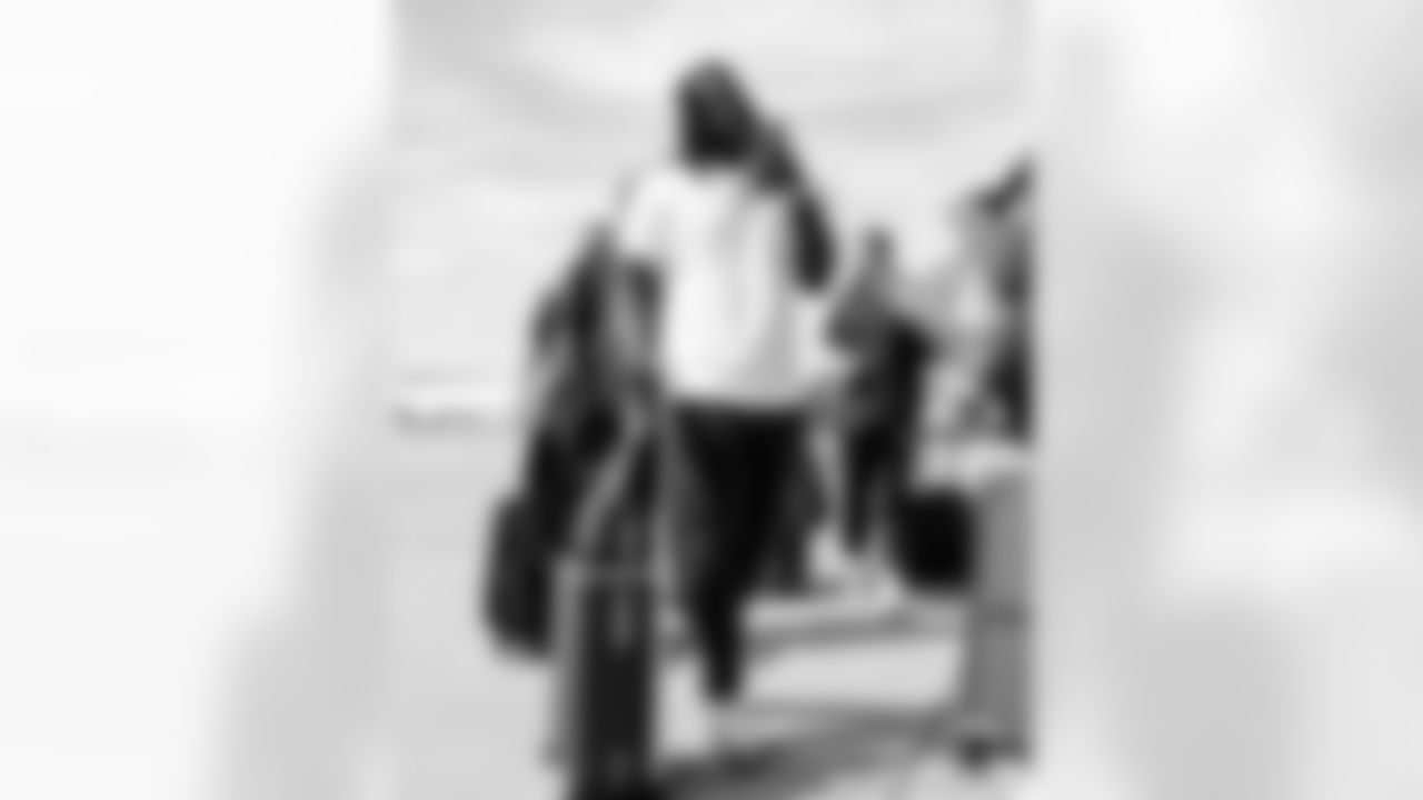 McTelvin Agim on the tarmac at Denver International Airport on September 11, 2021 during the team's travel to New York for a Week 1 game against the Giants. (Photo by Joe Abdellah)