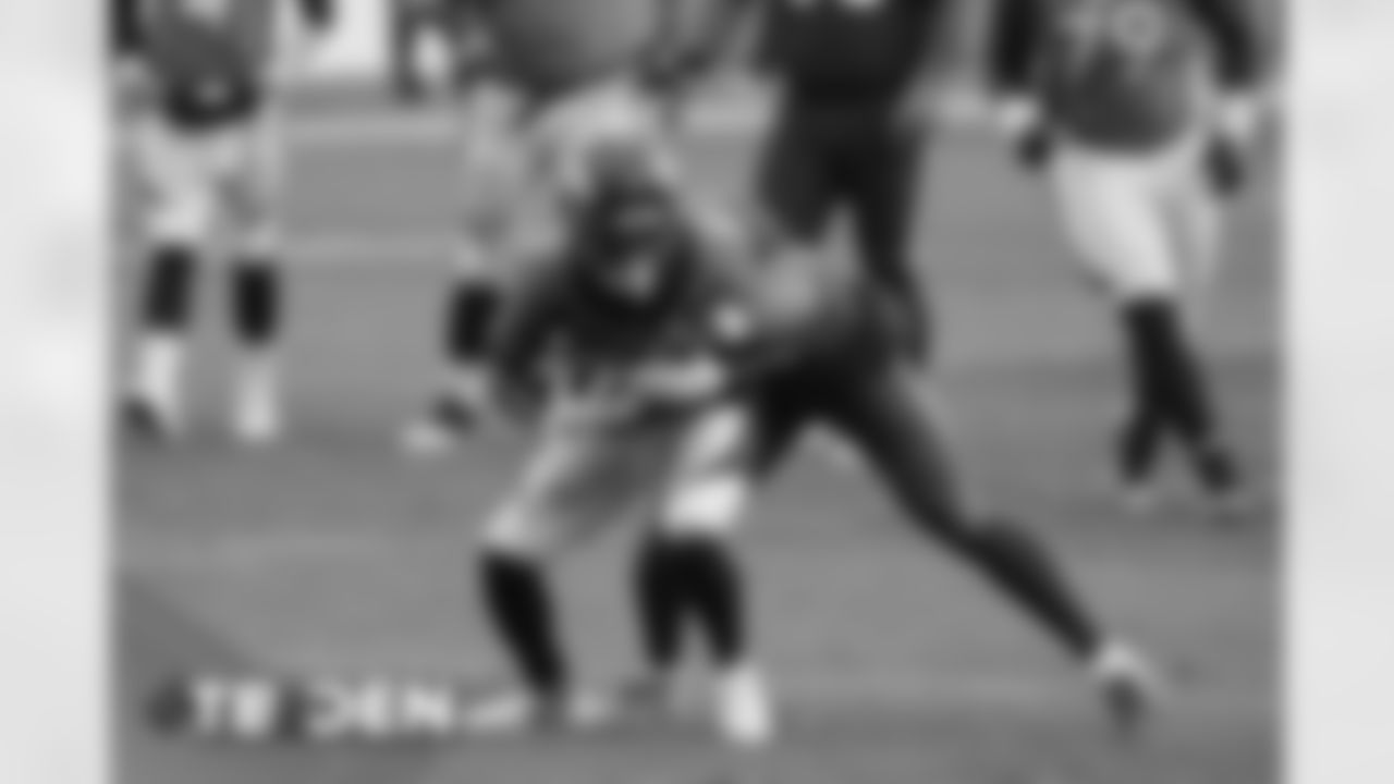 Diontae Spencer makes a catch and tries to break a tackle during the second half of the Broncos' Week 3 game against the Tampa Bay Buccaneers at Empower Field at Mile High on September 27, 2020. (Photo by Ben Swanson)