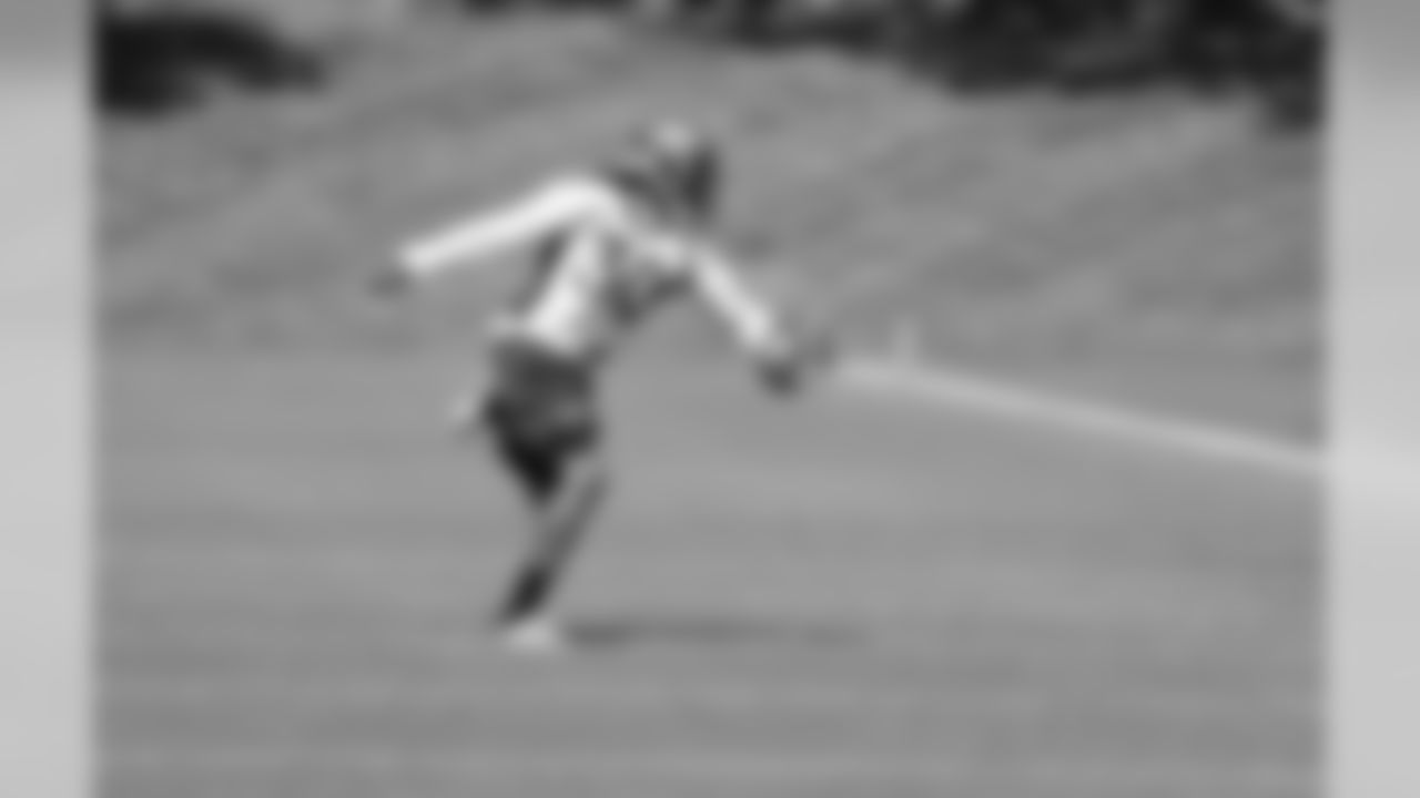 S David Bruton snags a pass with one hand.