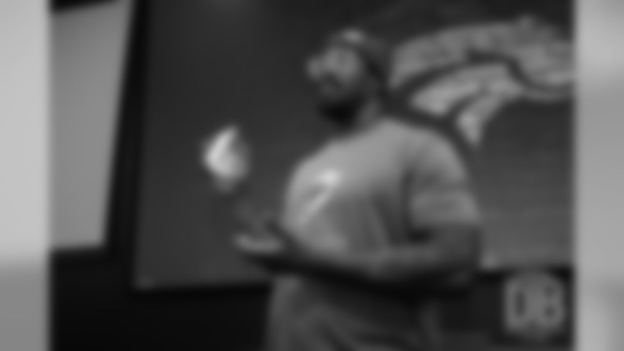 during the Broncos' 2018 community awards announcement ceremony during a team meeting on December 6, 2018.