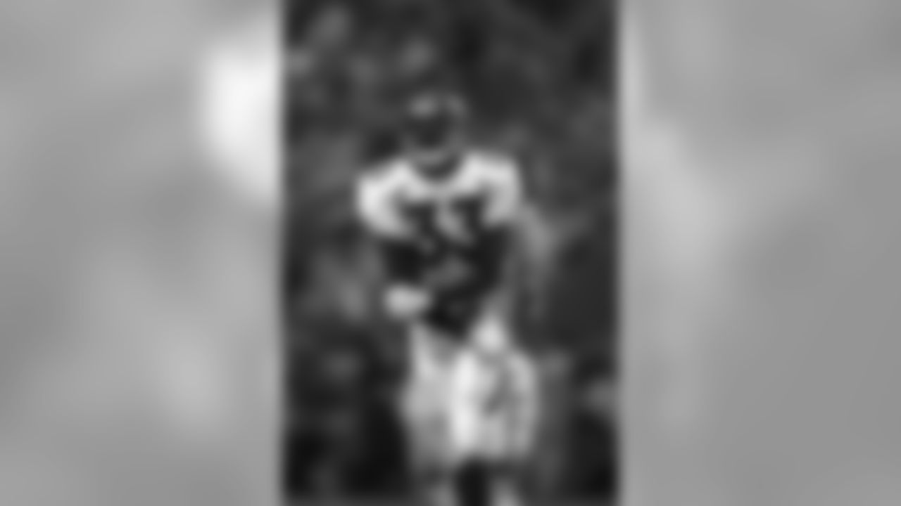 Dedrick Dodge celebrates after a failed field goal attempt by Kansas City. The first attempt was successful, but Dodge drew a Kansas City player offsides, so the ball was pushed back 5 yards and re-kicked.